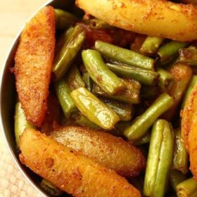 french bean recipe served in a steel bowl.