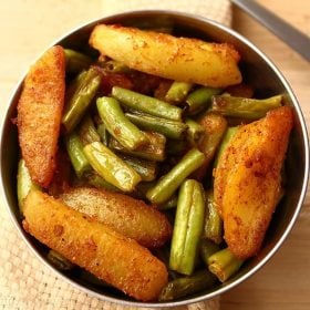 french bean recipe served in a steel bowl.