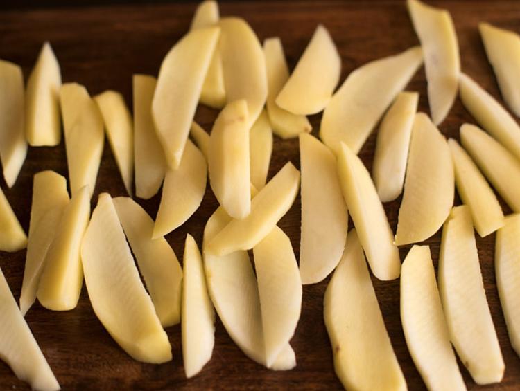 potatoes cut in thin wedges