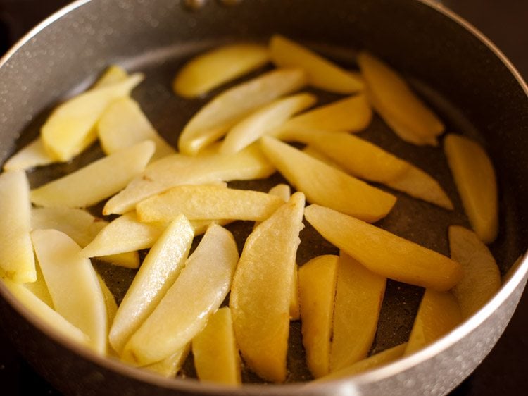 sautéing the potatoes