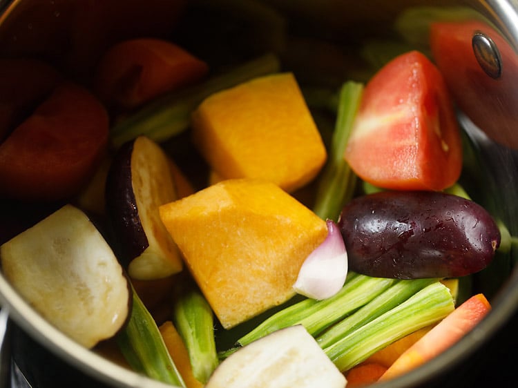 veggies added to a pot to make sambar recipe