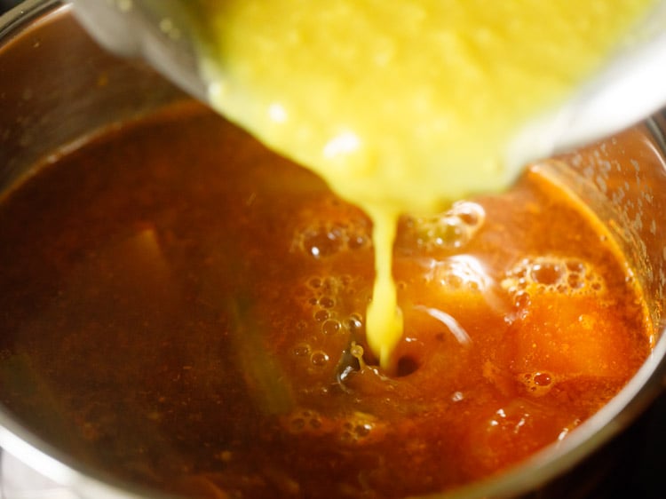 mashed lentils being added