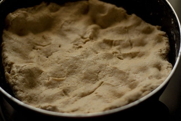 paratha dough in a bowl after kneading for 10 minutes.