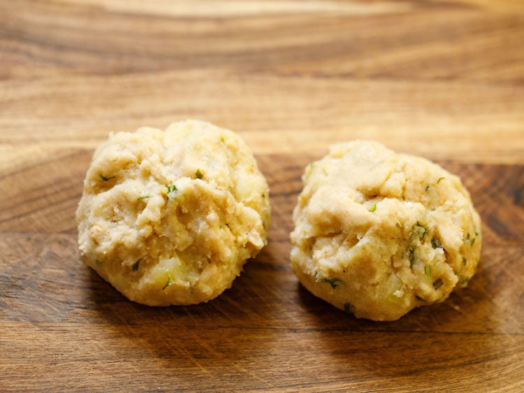 edges of the potatoes brought to the center and sealed at the top. 