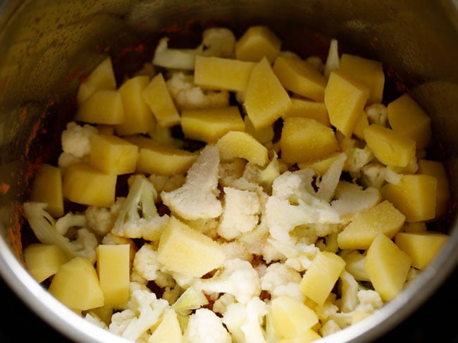 add cauliflower and potatoes to instant pot