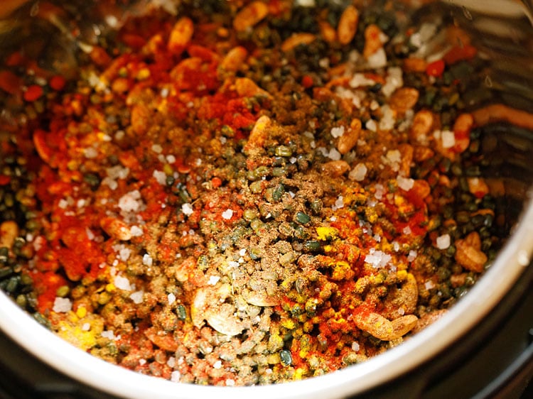 spice powders and salt added on the lentils. 