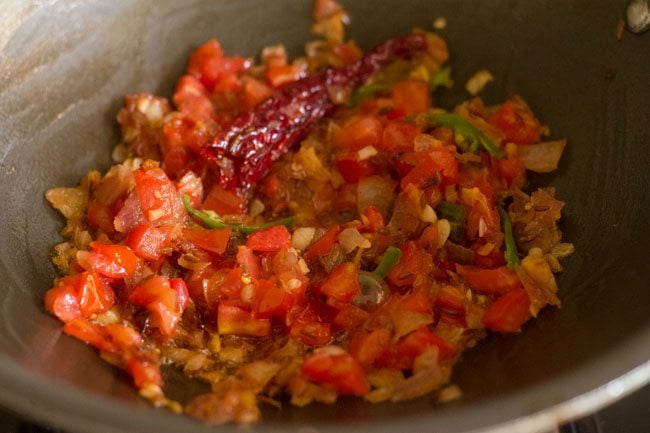 tomatoes being sautéed 