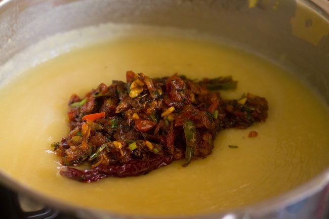 sautéed mixture added to cooked dal to make moong dal fry