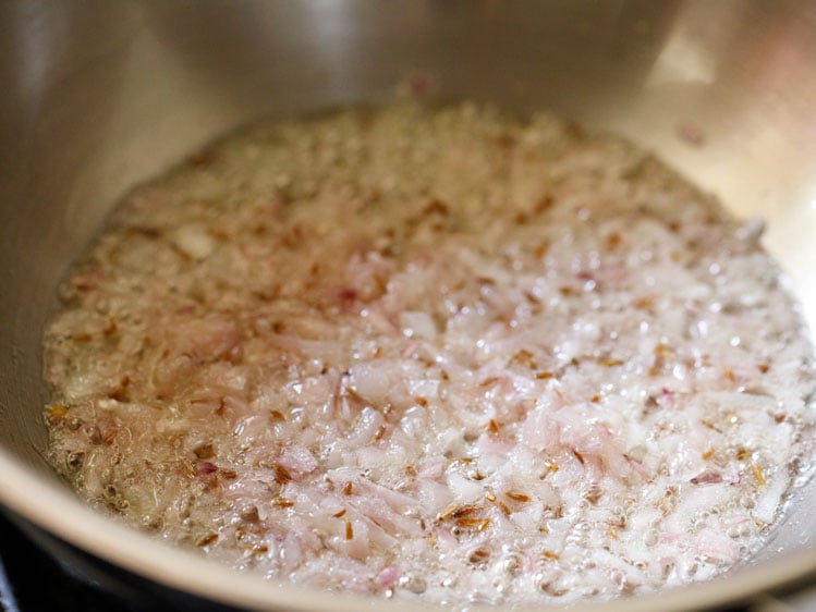 sautéing onions till translucent for paneer bhurji recipe. 