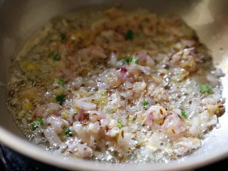 sautéing onion mixture for paneer bhurji recipe. 