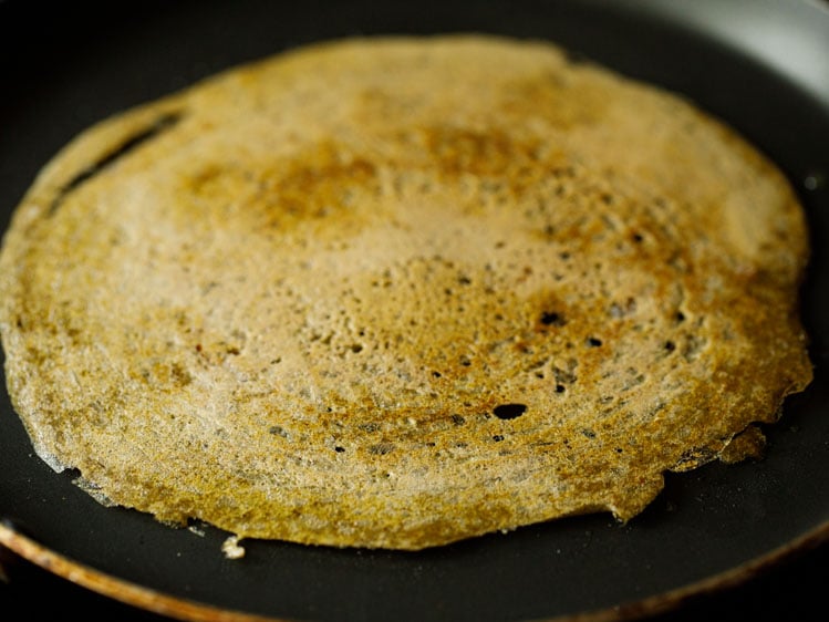 moong dal dosa or pesarattu flipped on tawa