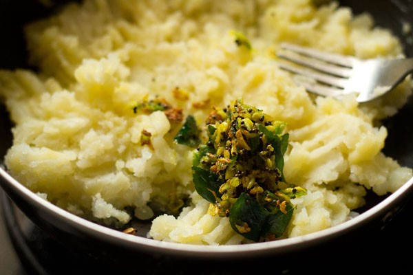 pour tempering into mashed potatoes