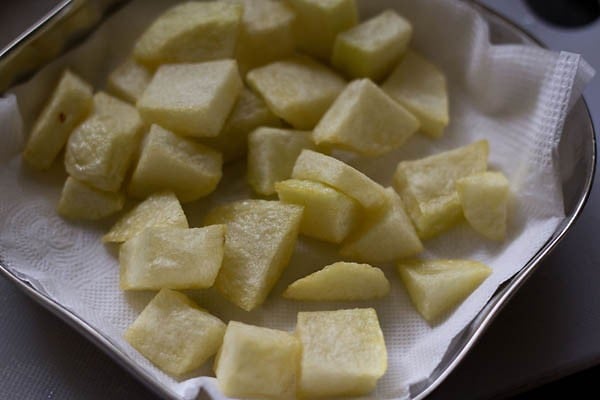 fried potatoes on paper towels