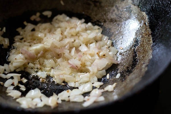 sauteing onions in a pan