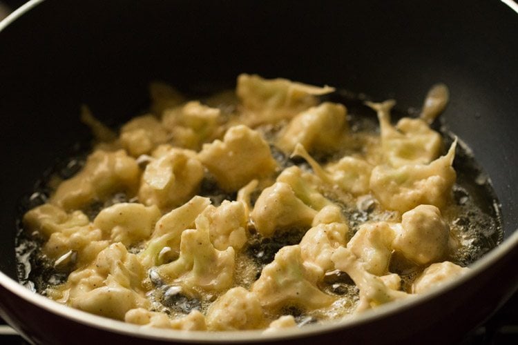 gobi florets frying in hot oil