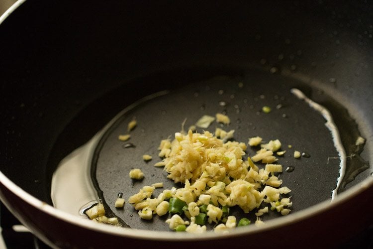 ginger, garlic and green chillies with oil in a pan