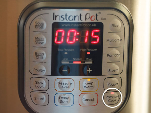 setting pressure cook mode and timer to 15 minutes