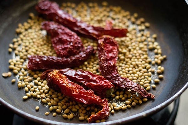 spices for kadai masala being roasted