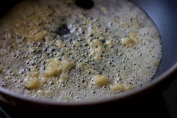 ginger-garlic paste being sautéed in butter