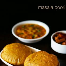 masala poori served in a plate with a side of potato curry and pickle