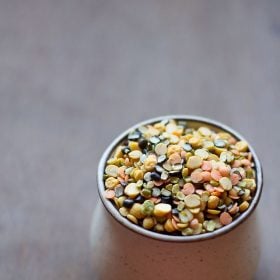 lentils and pulses in a white creamish bowl.