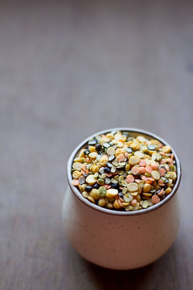 lentils and pulses in a white creamish bowl.