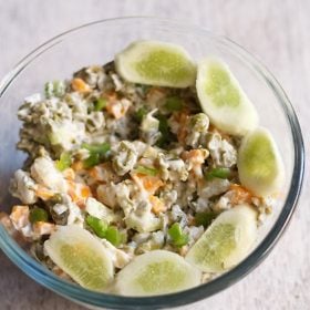 veg russian salad served in a glass bowl.