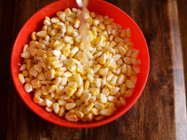 rinse corn kernels in water and drain all water