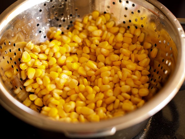 corn kernels in a colander