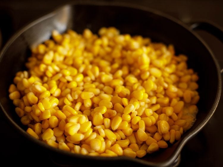 add corn kernels to butter