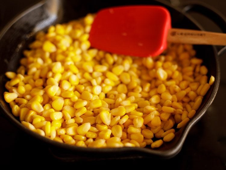 mix corn kernels with butter