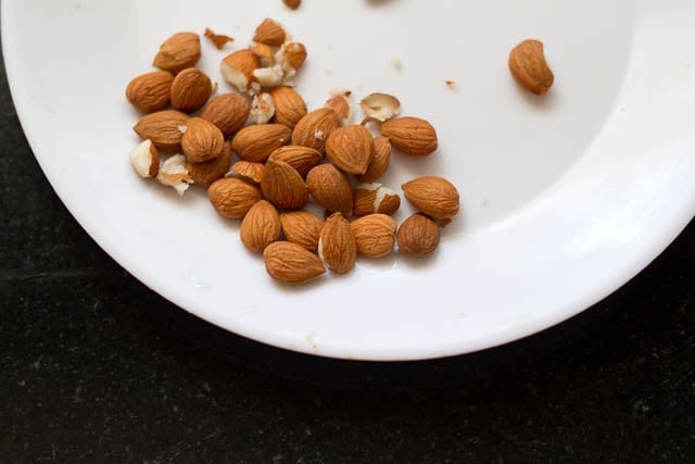 apricot nuts from the kernel on a white plate