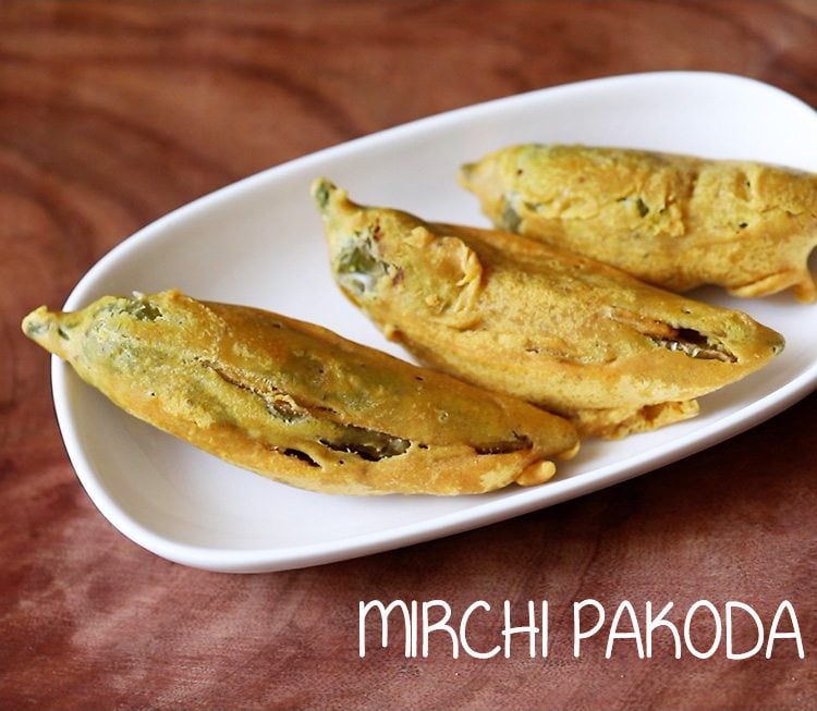 mirchi pakoda served on a white plate with text layover.