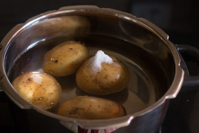 potatoes with salt in a stove top pressure cooker