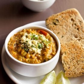 paneer pav bhaji served with pav on a white plate