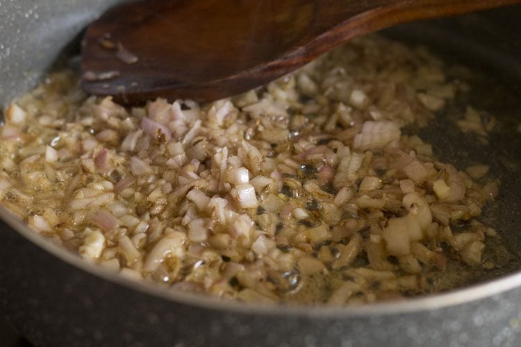 sauteing the chopped onions