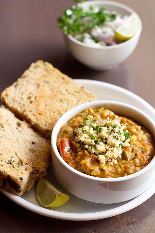 paneer pav bhaji served with pav on a white plate