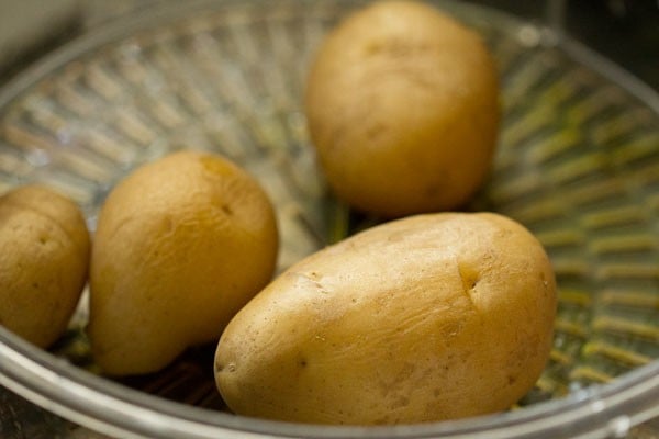 boiled potatoes in a steamer