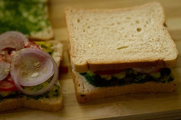 cover the bread with remaining bread slice