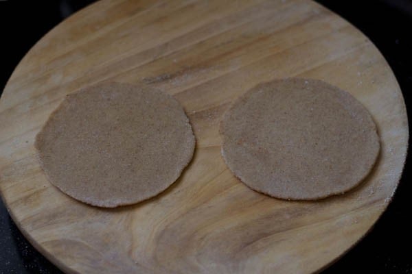 roll the dough for making mooli paratha recipe