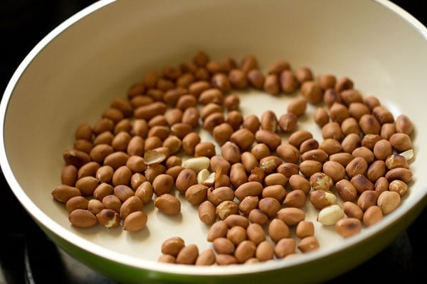 roasting peanuts in a pan