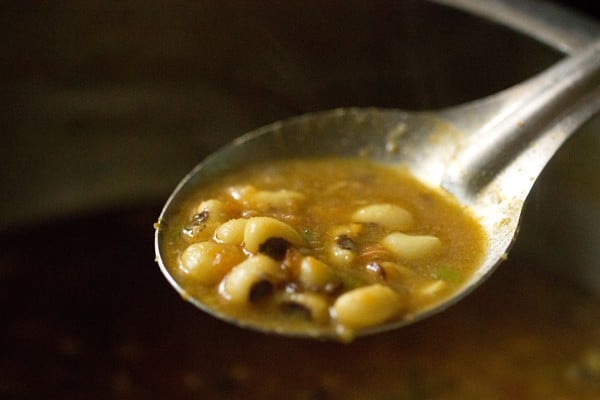 black eyed beans curry in a steel spoon