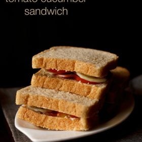 tomato cucumber sandwich served on a plate with text layover.