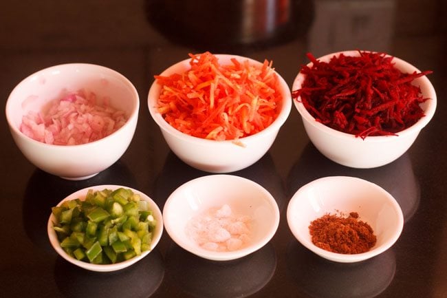 Beetroot Raita ingredients set aside in white bowls.