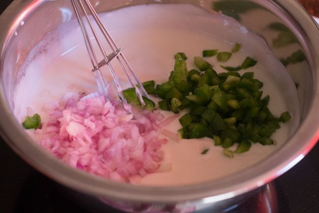 onions and capsicum added to curd