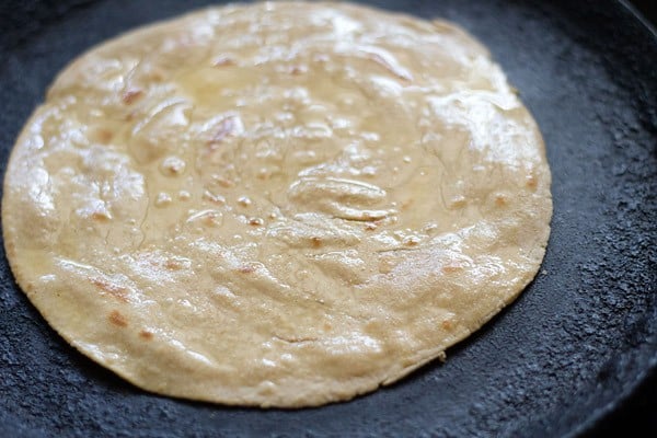 apply ghee on lachha paratha