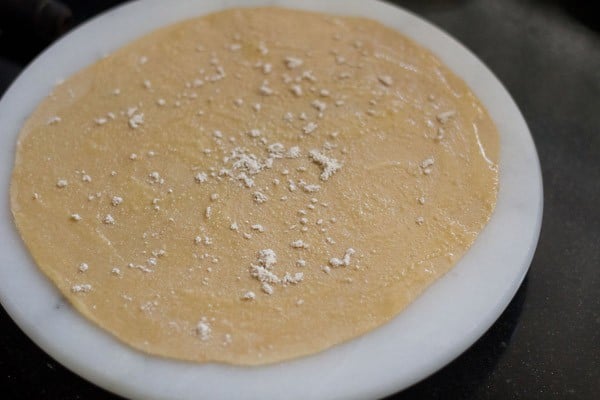 sprinkle flour on rolled dough