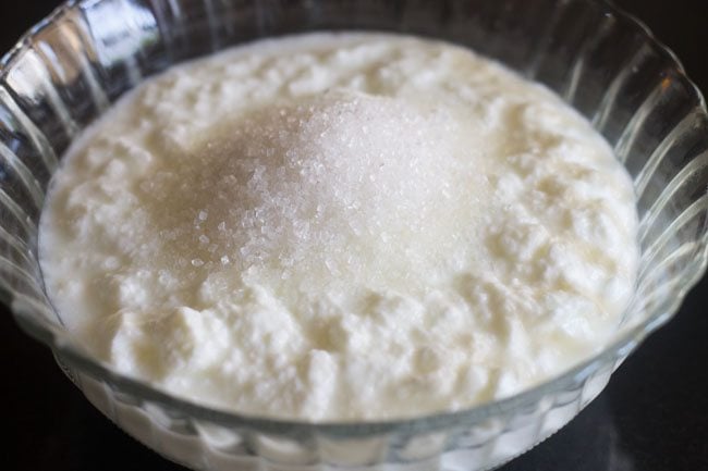 curd and sugar in a bowl
