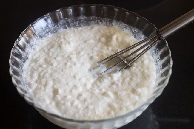 mixing curd and sugar