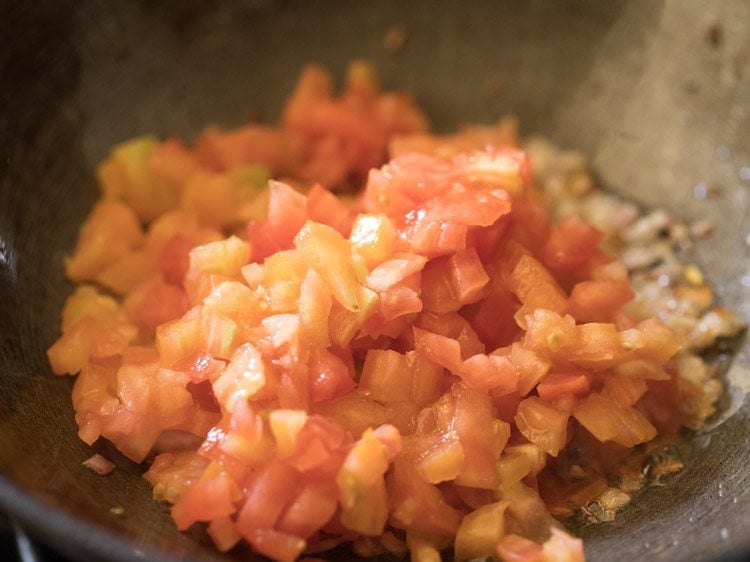 diced tomatoes added to aromatic mix